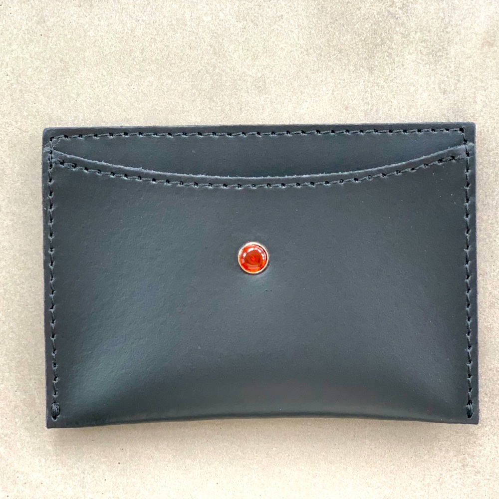 Brand new black leather Batycki card holder / wallet with amber eye